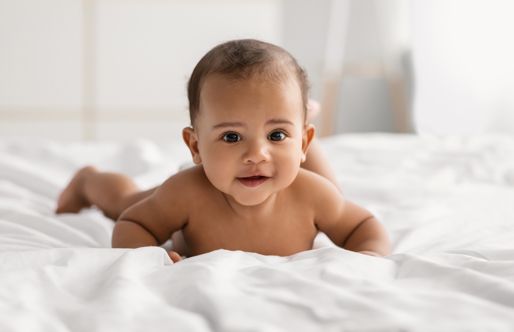 Morning,Time.,Portrait,Of,Cute,Naked,African,American,Baby,Crawling